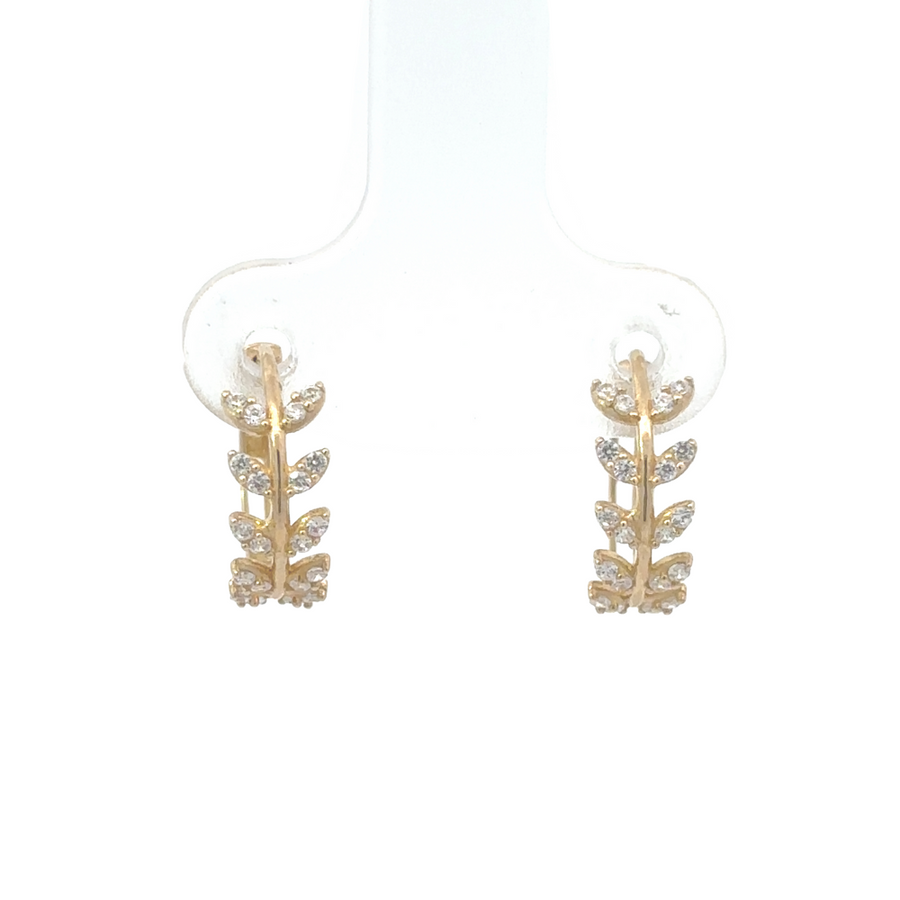 Close-up of 10K gold CZ earrings for babies, highlighting the sparkling cubic zirconia stones