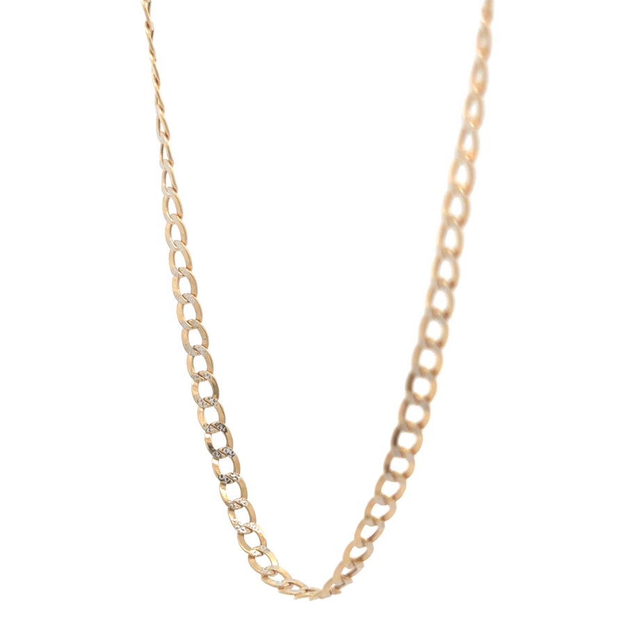 Model wearing the 10k gold Cuban chain, showcasing its bold and masculine design.