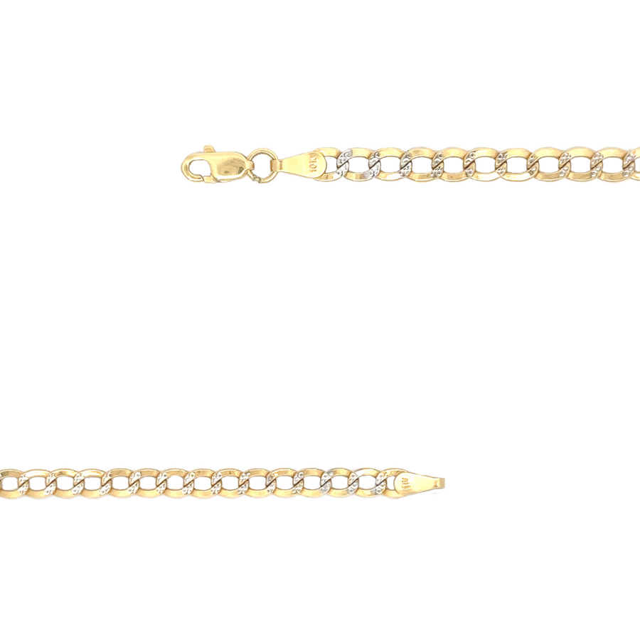 Flat lay of the 10k gold Cuban link chain, emphasizing its sleek design and high-quality finish.