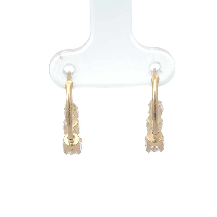 Minimalist 10k gold stud earrings with cubic zirconia accents