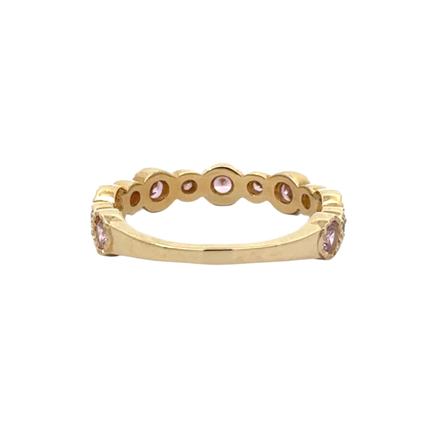 14K gold aro ring showcasing the rose-colored cubic zirconia with a polished gold finish