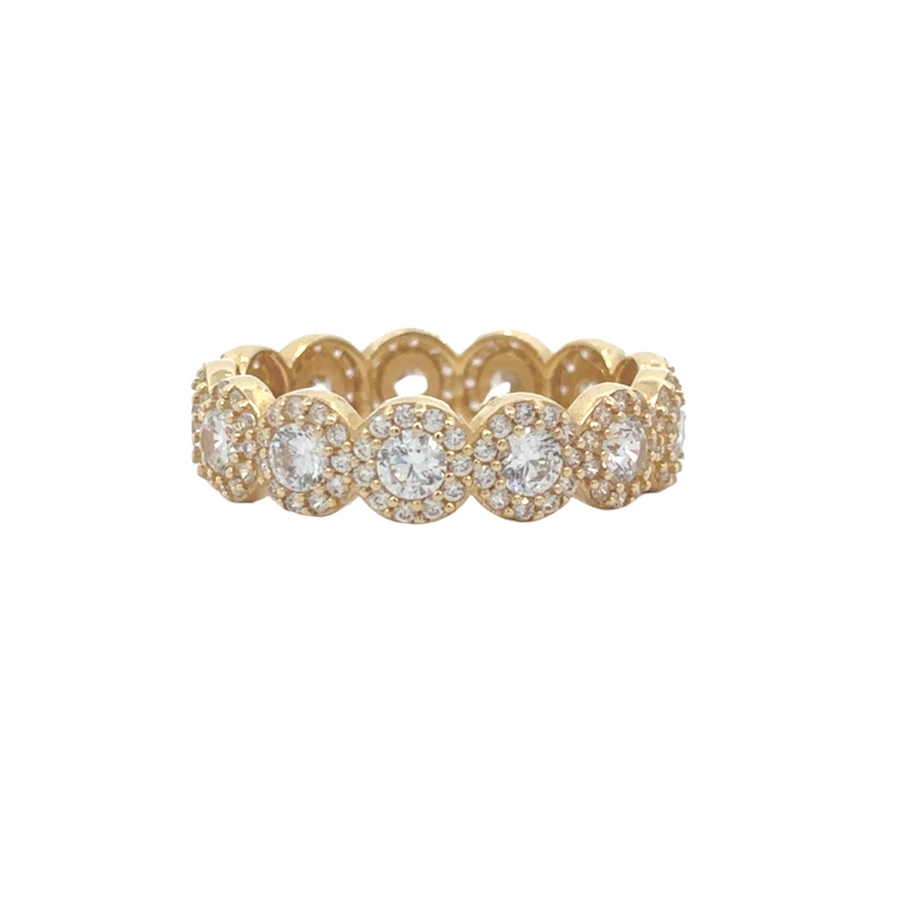14K gold ring featuring floral design and CZ accents, displayed on a soft velvet background