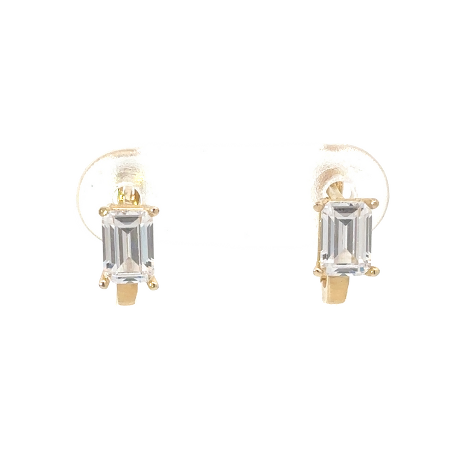Close-up of minimalist 14K gold earring with rectangular cubic zirconia