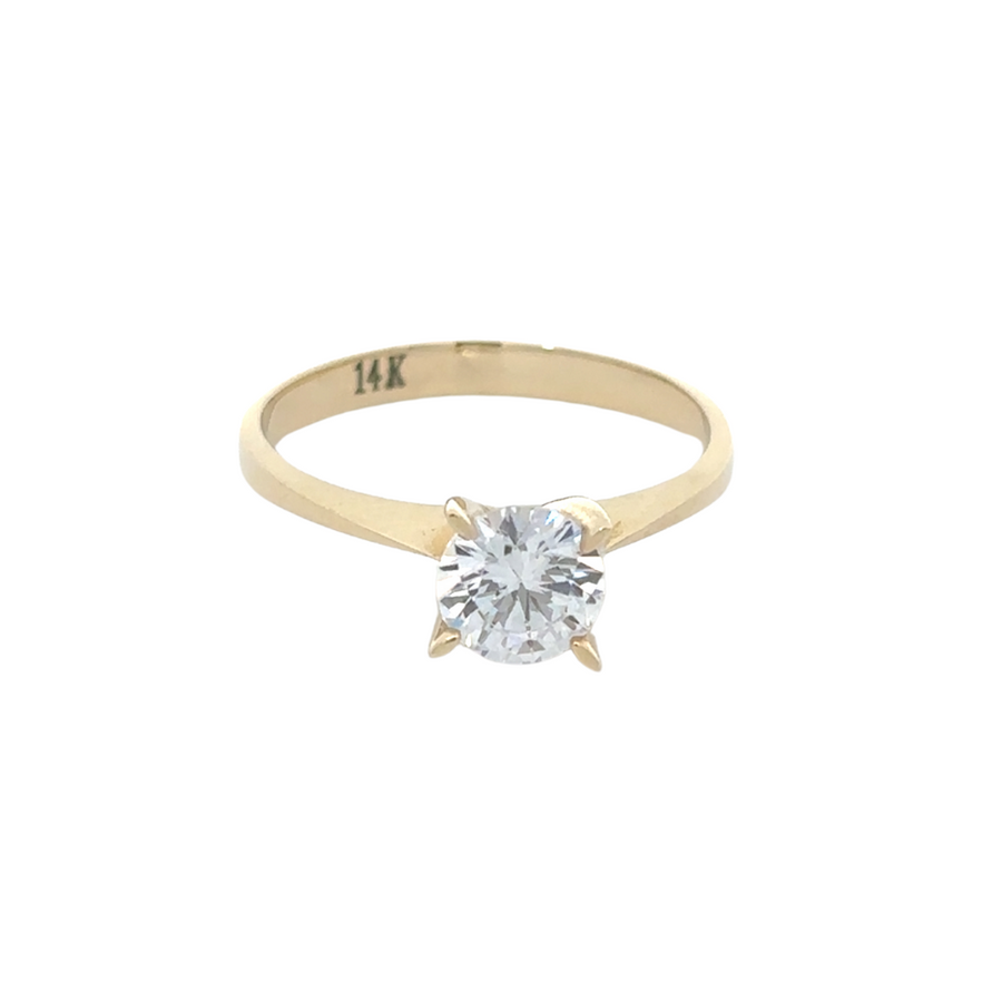Close-up of the 14K gold solitaire ring, showcasing the polished finish and classic design