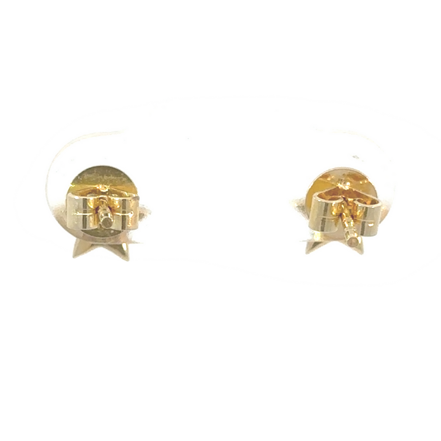 14K gold star earrings adorned with diamonds for a luxurious look