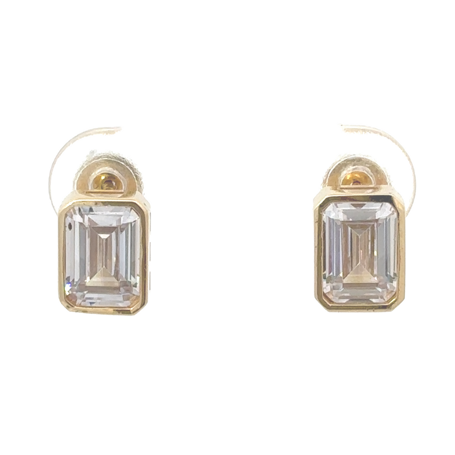 Close-up of 14K gold stud earrings on a white background, highlighting their polished finish