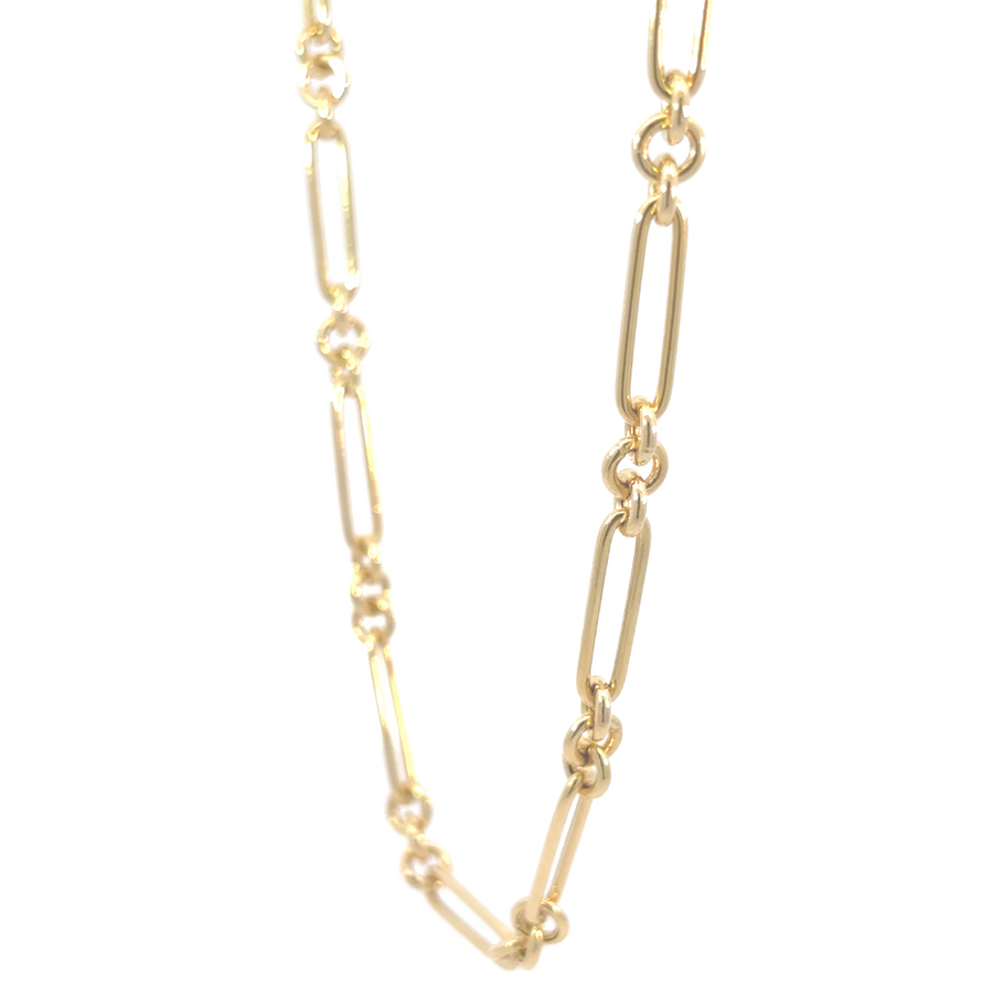 Elegant 14K gold unisex necklace displayed on a velvet background