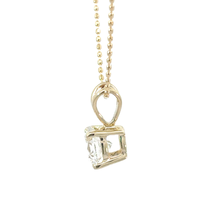 Unisex pendant with lab diamond displayed on black velvet