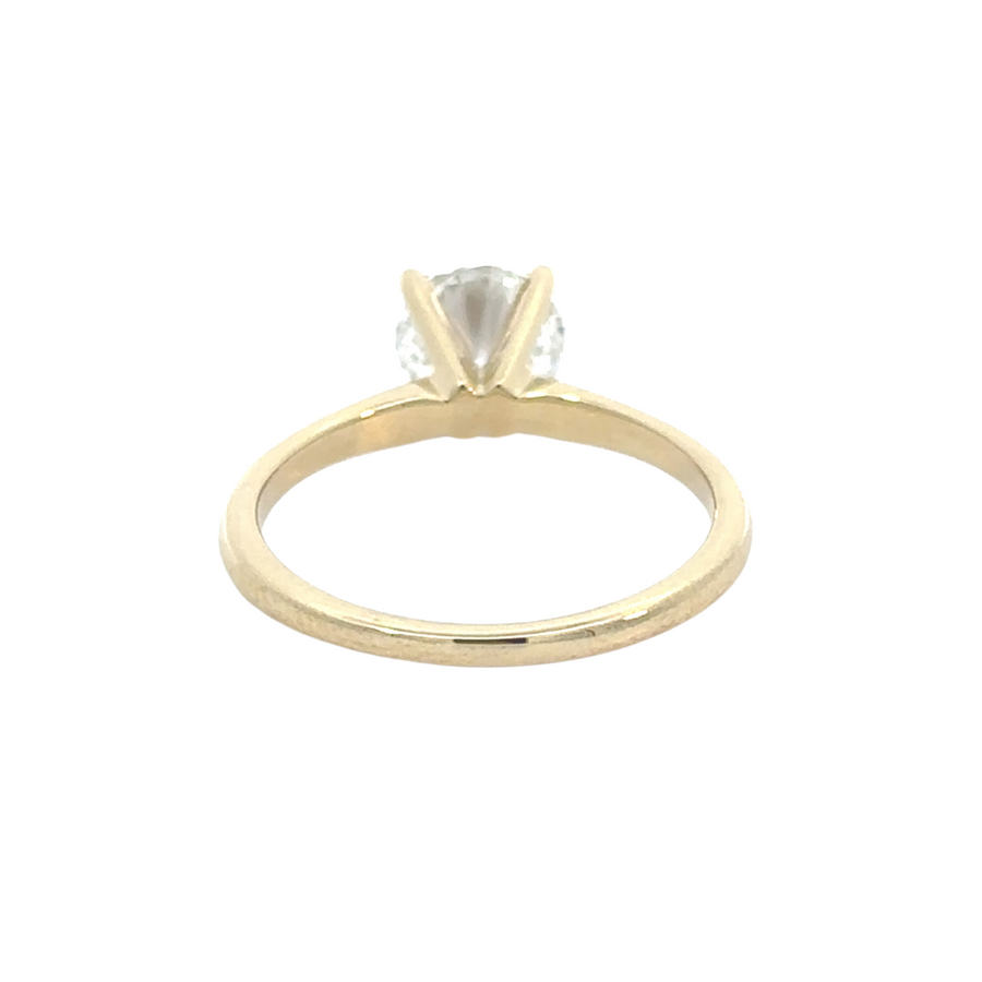 Lifestyle shot of woman wearing 14K gold diamond ring during a special event