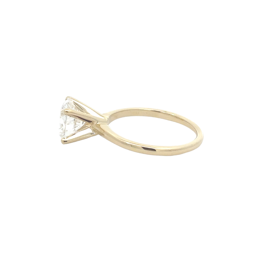 Hand model wearing 14K yellow gold lab diamond ring for women