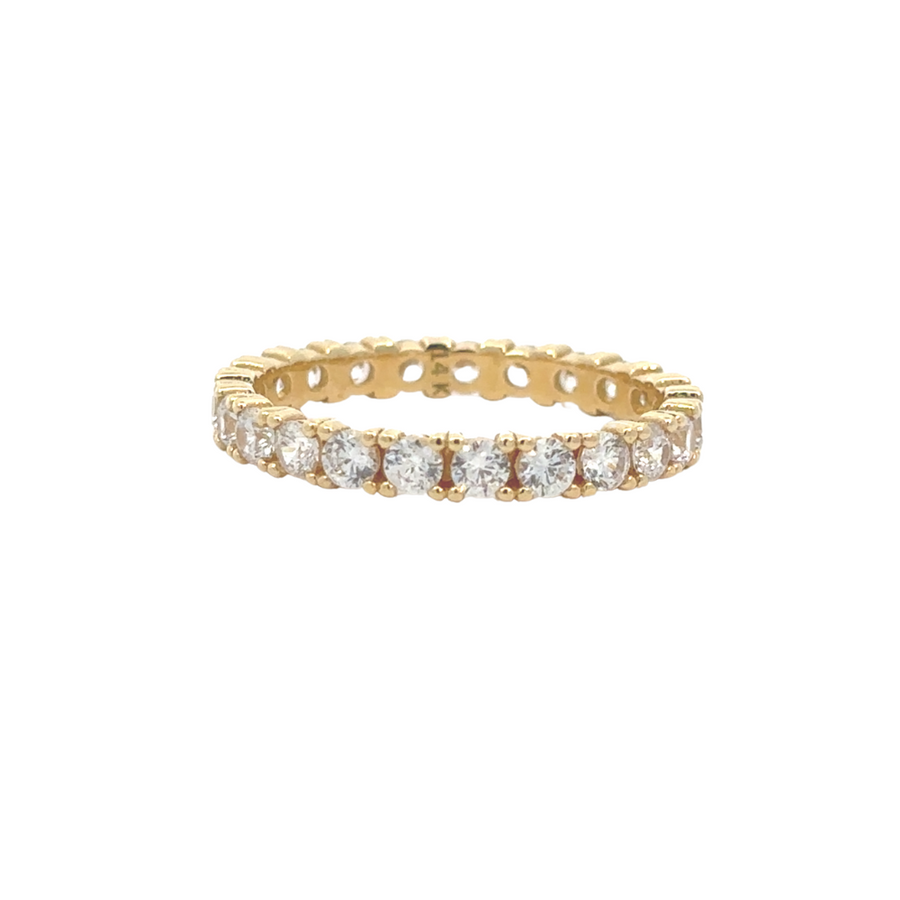 Modern and chic 14K yellow gold ring featuring square-cut CZ stones, displayed on a minimalist background.