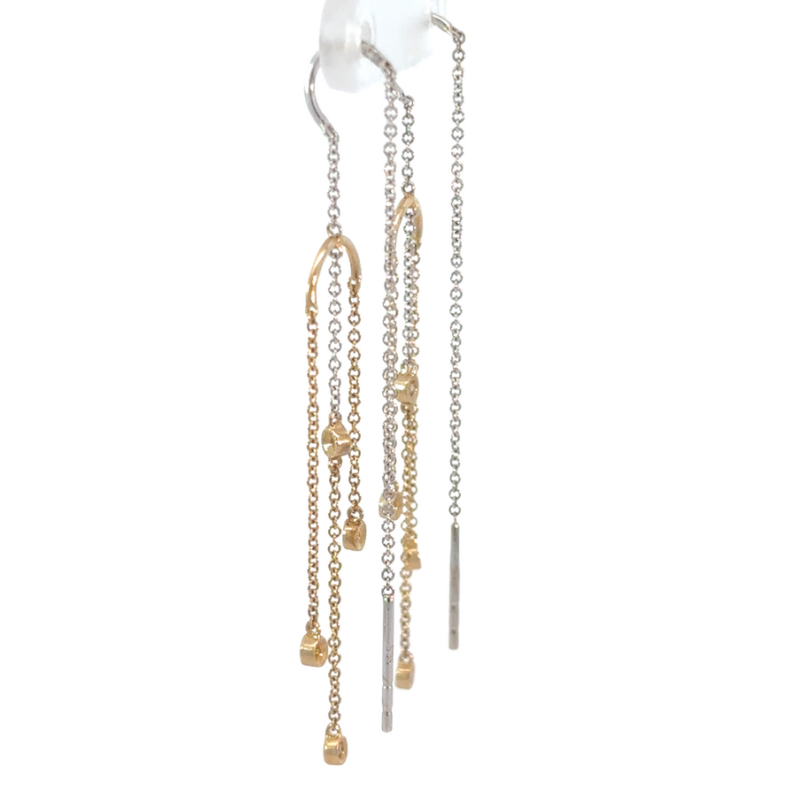 Elegant drop earrings in 14k gold featuring CZ stones