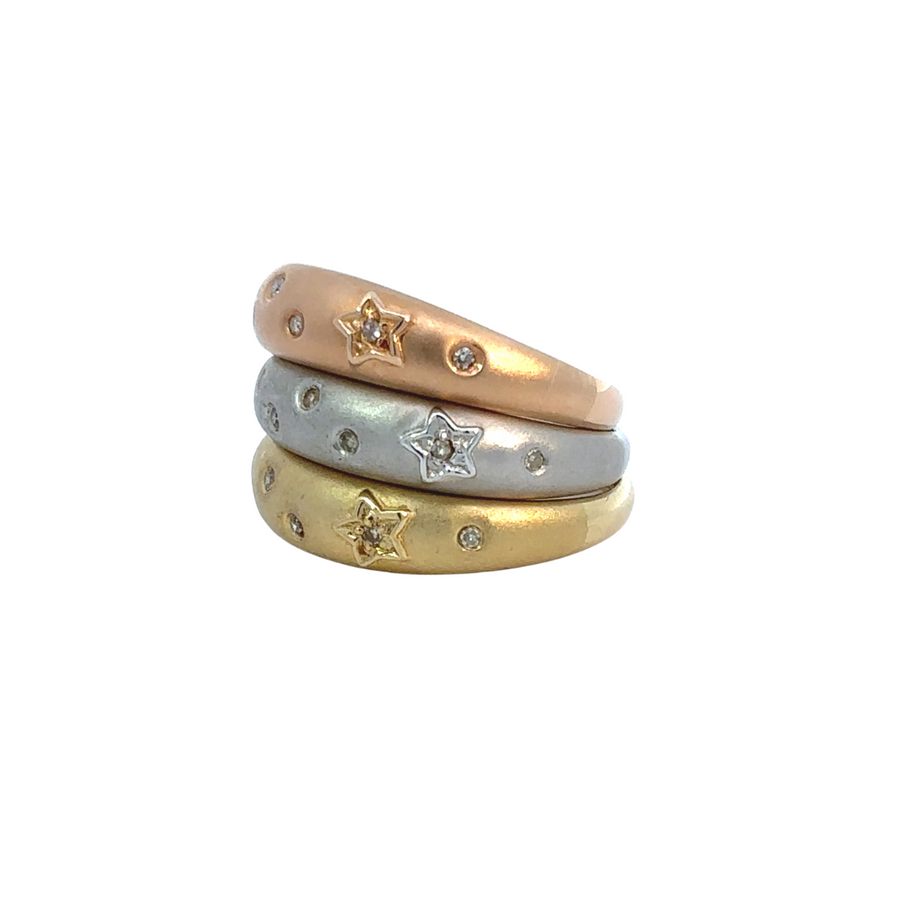 Yellow, white, and rose gold rings with diamond accents