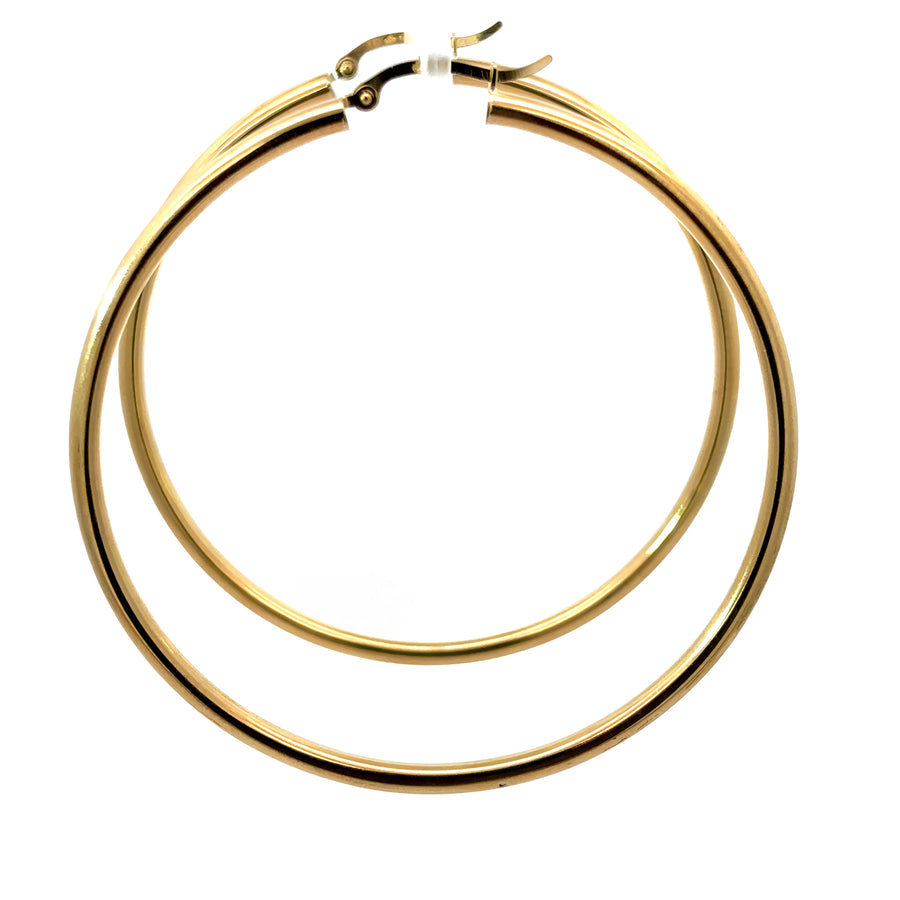 Smooth, shiny finish on 14k gold 65mm hoop earrings