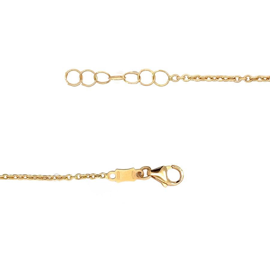 Baby wearing a simple 14k gold bracelet with adjustable fit