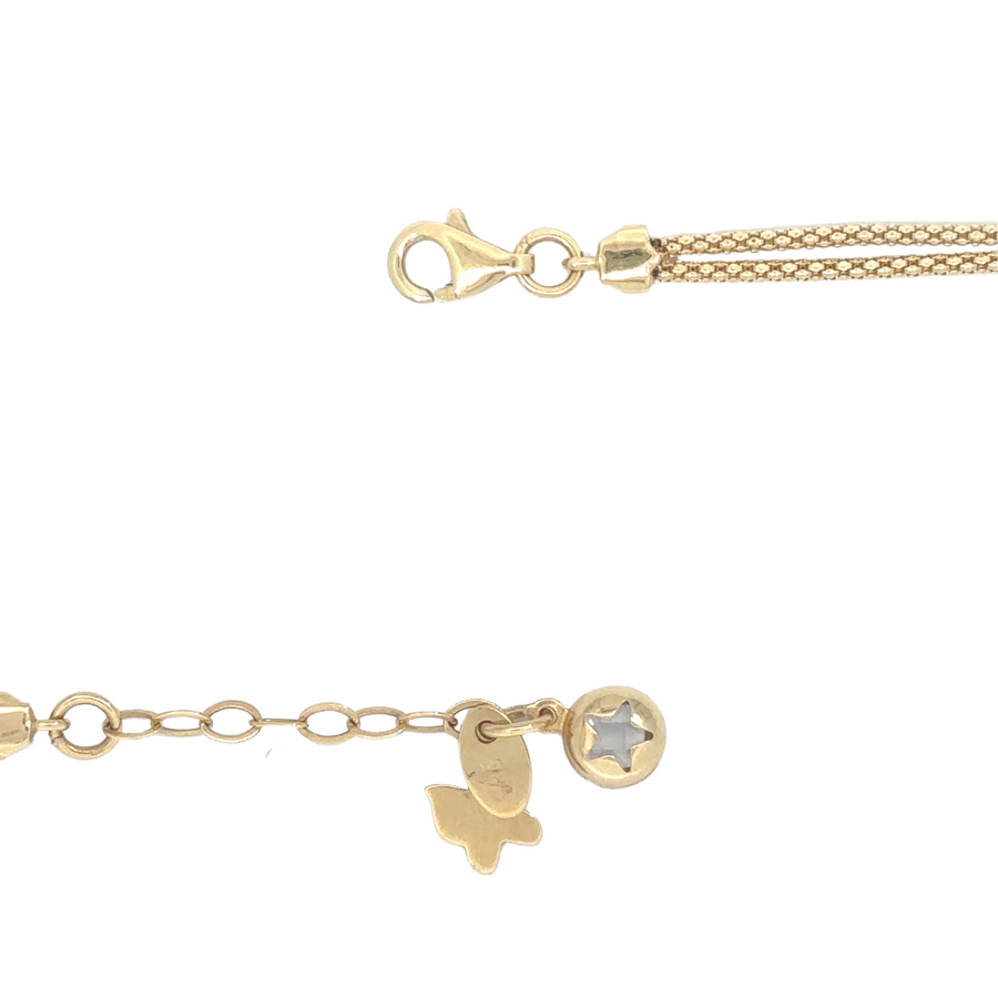 Adjustable 14k gold bracelet worn on a woman's wrist, showing a perfect fit