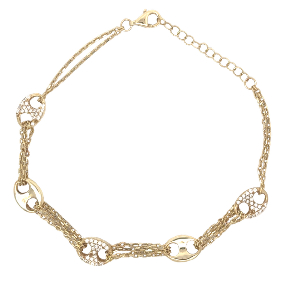 Close-up of clasp mechanism on adjustable gold bracelet