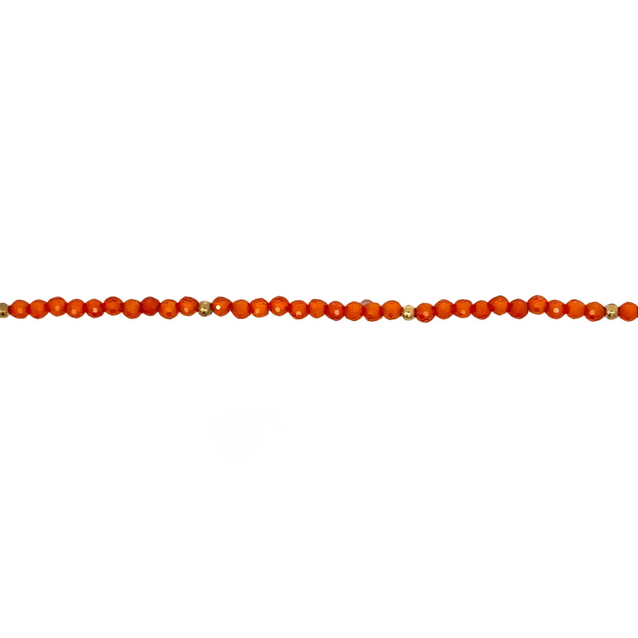 Adjustable 14k gold bracelet with bold orange gemstone