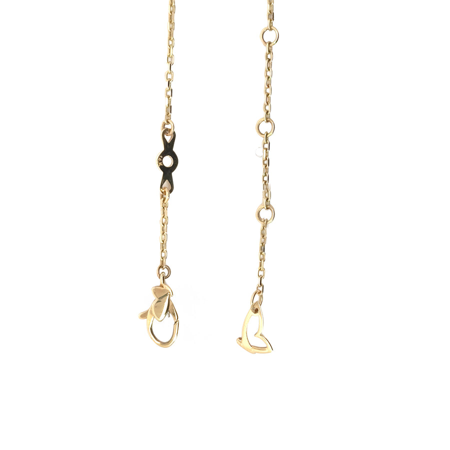 Woman wearing adjustable 14k gold necklace