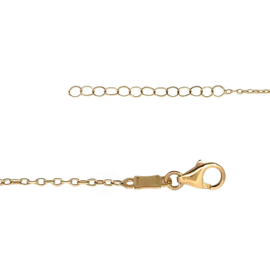 Baby wearing 14k gold necklace for special occasion