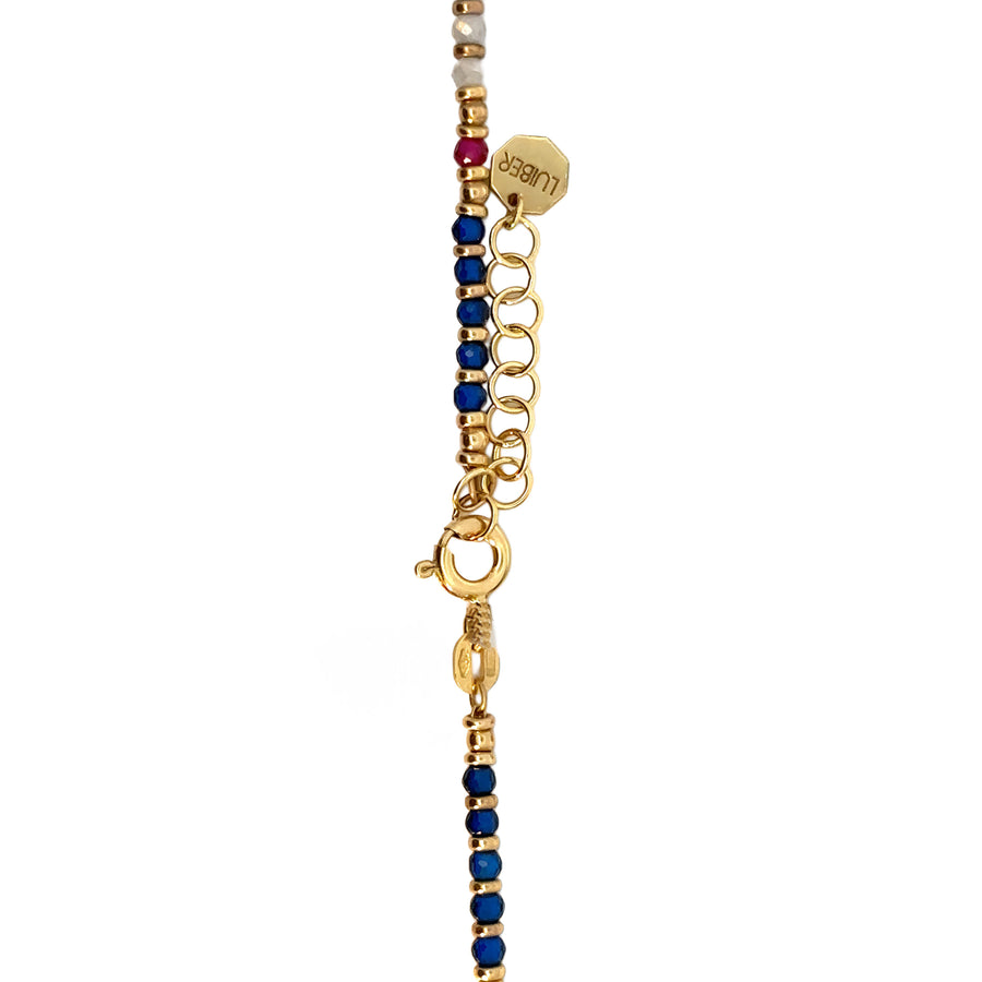 Necklace laid flat showing adjustable clasp and stone details