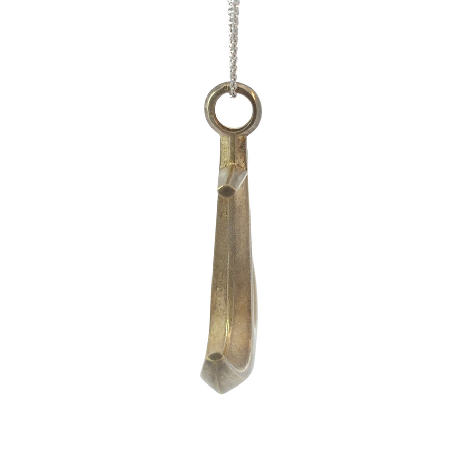 Close-up of 14k gold anchor pendant highlighting the fine craftsmanship