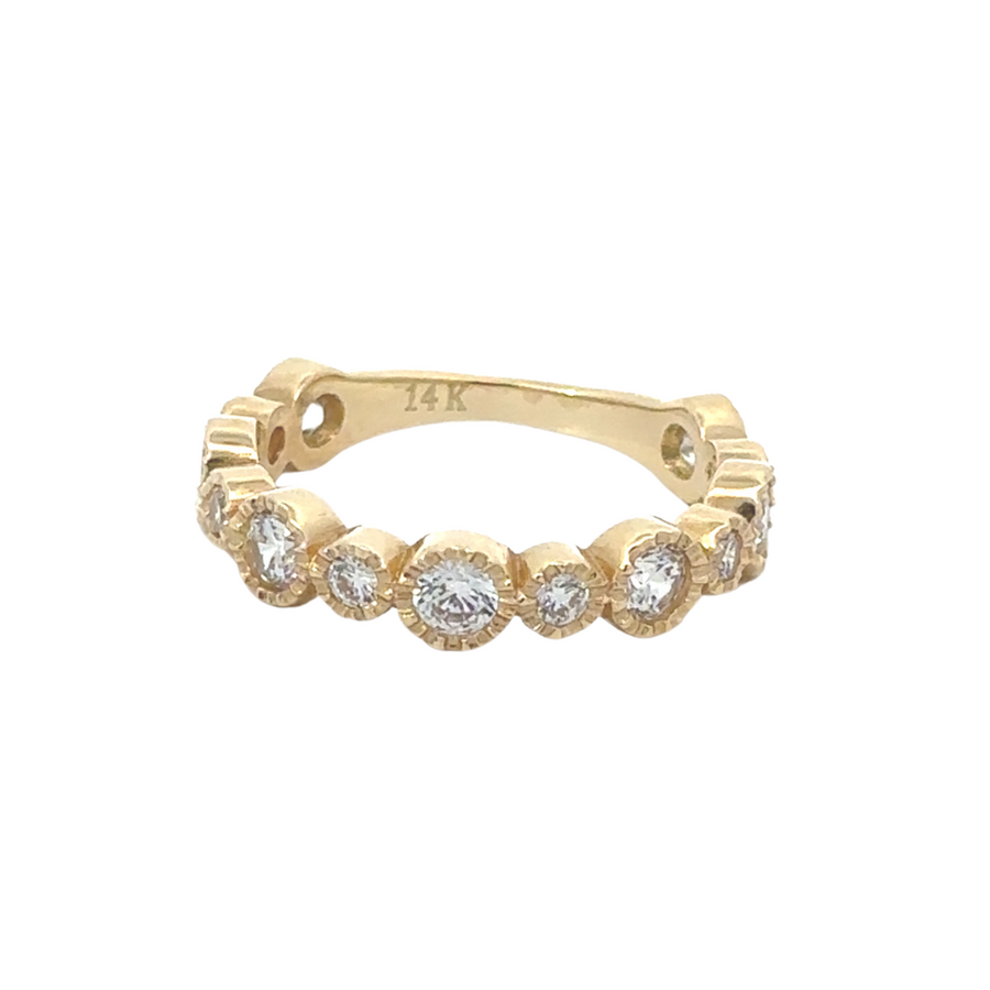 Close-up of a 14k gold aro ring with CZ stones showcasing its elegant design