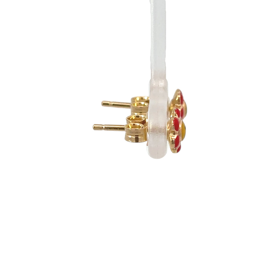 Lightweight 14k gold baby earrings on white background