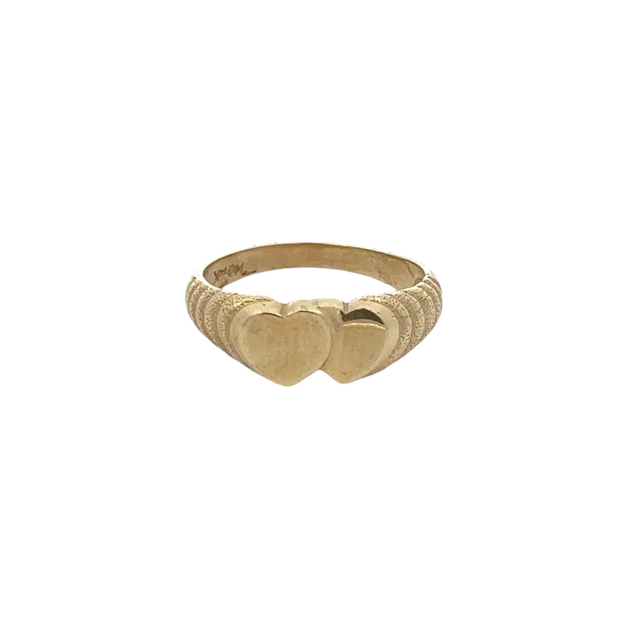14k gold baby ring with double hearts on a white background