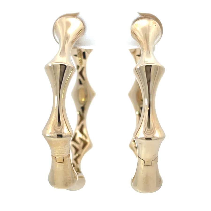 Timeless 14k gold bamboo hoop earrings with polished shine