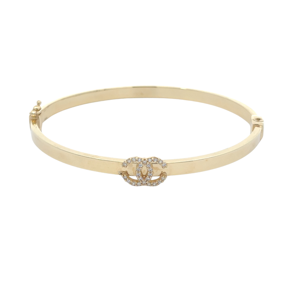 Unisex 14k gold bangle with sleek and minimalist design