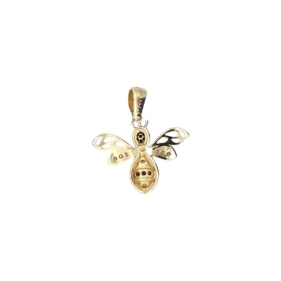 Delicate gold necklace with a detailed bee charm