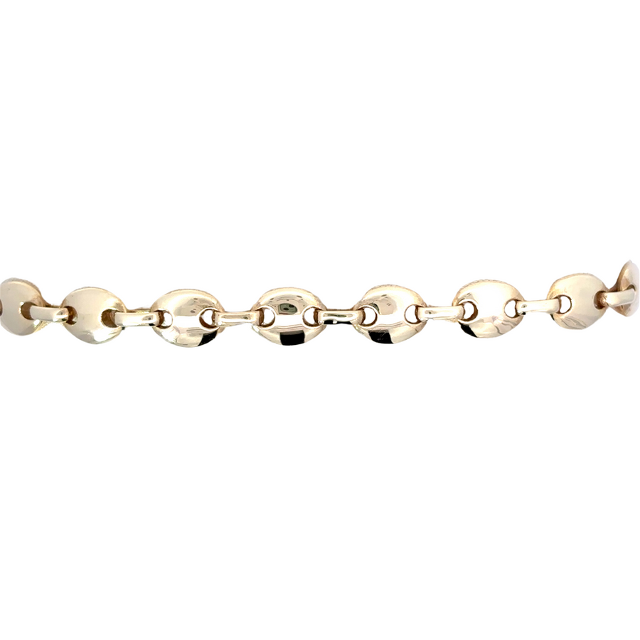 Man wearing 14k gold bracelet with a casual outfit
