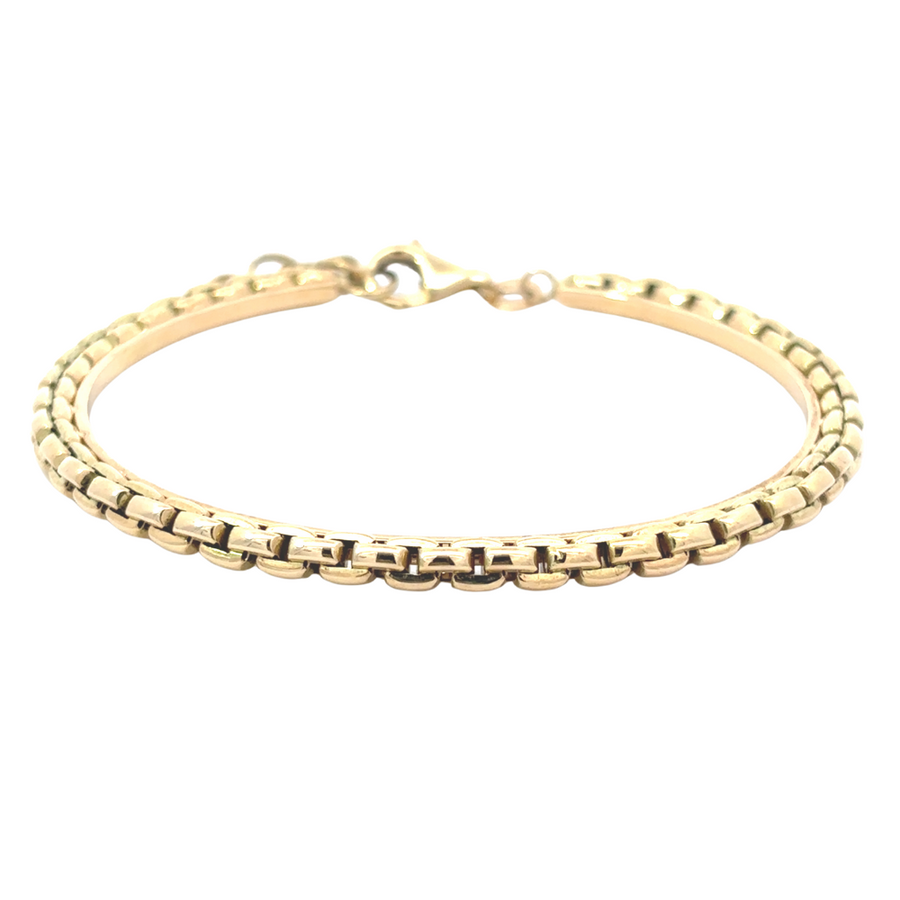 Model wearing the 14k gold bracelet, showcasing its elegance and comfort on the wrist.