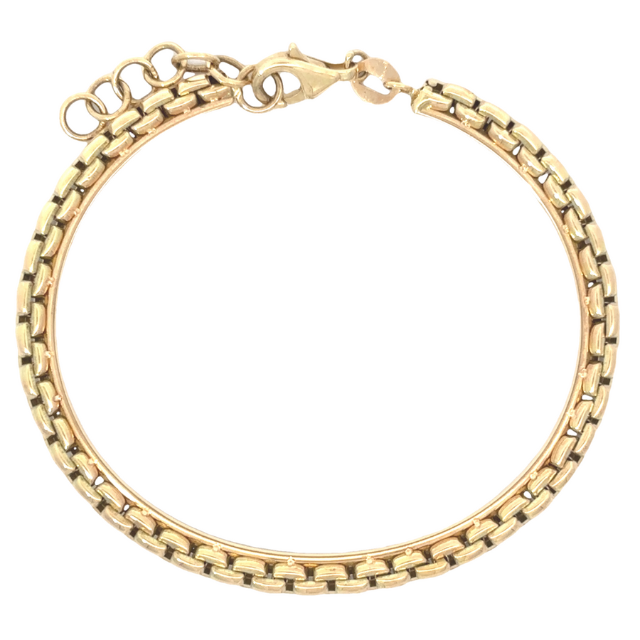 Close-up shot of the 14k gold bracelet, emphasizing its delicate 5.5 cm size and sleek design.