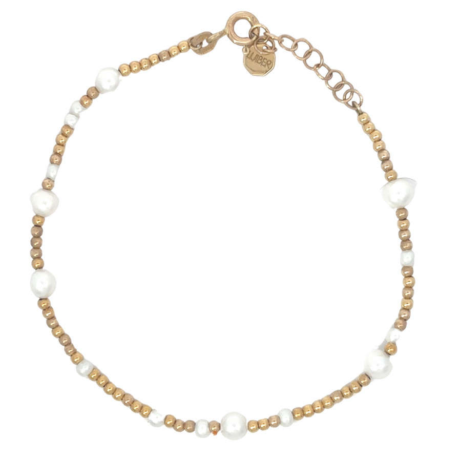 14k gold bracelet with single pearl on white background