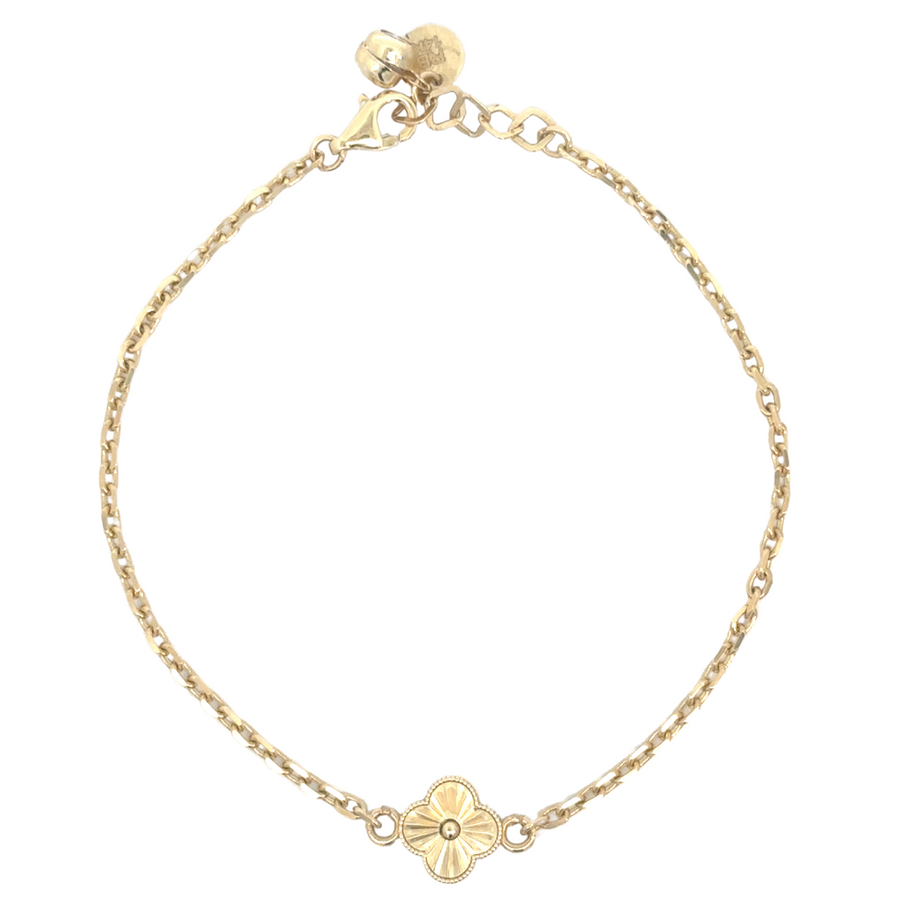 Elegant 14k gold bracelet with high-polish finish, showcasing its refined design.