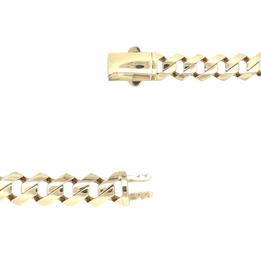 14k gold bracelet styled on a man’s wrist with a casual shirt