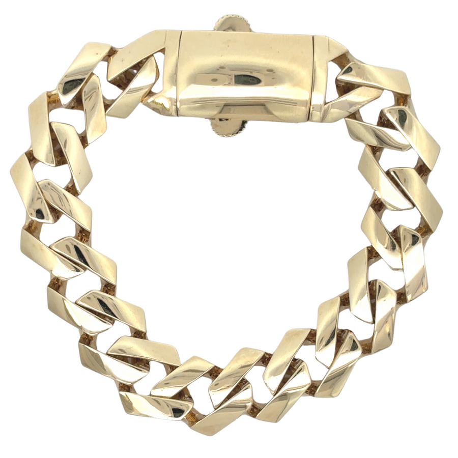 Flat-lay of 14k gold bracelet for men on a white background