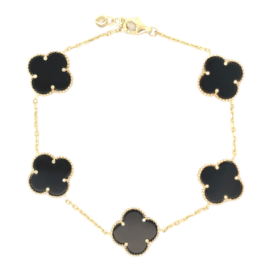 14k gold bracelet with 5 black stones displayed on white background