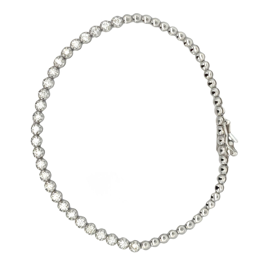 Close-up of elegant gold bracelet with diamond detail