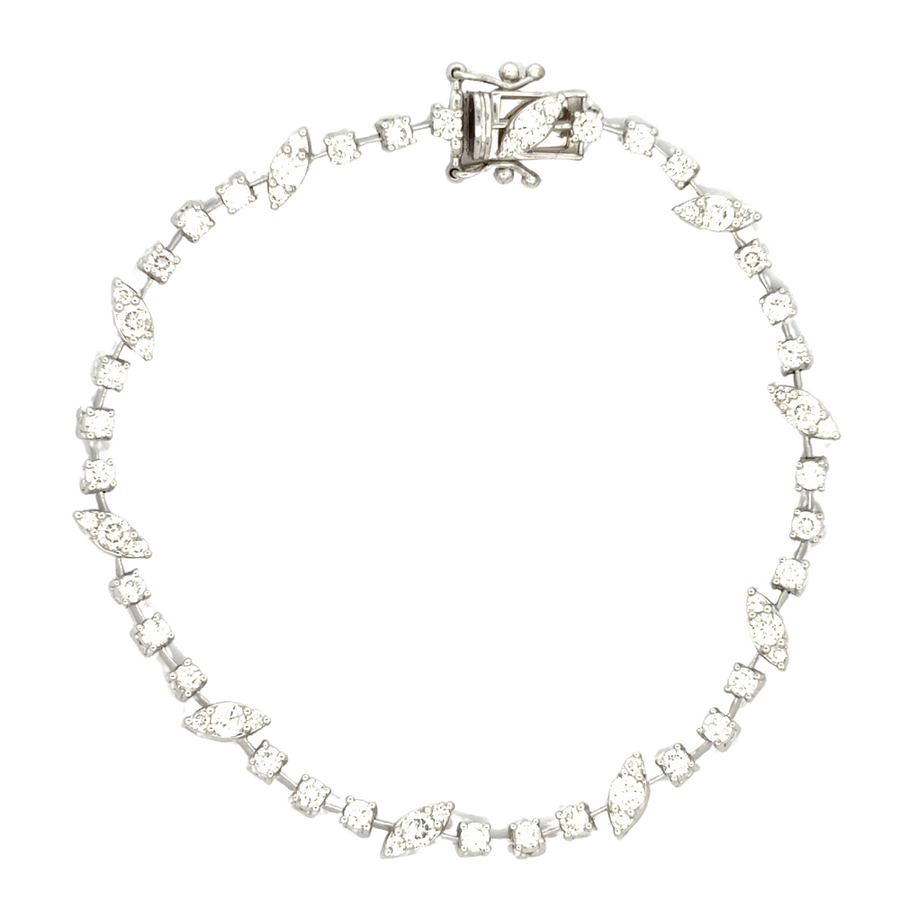 14k gold bracelet with leaf motifs and diamonds