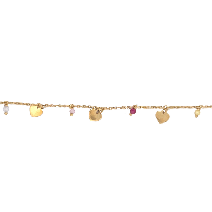Adjustable gold bracelet with heart detail on white background