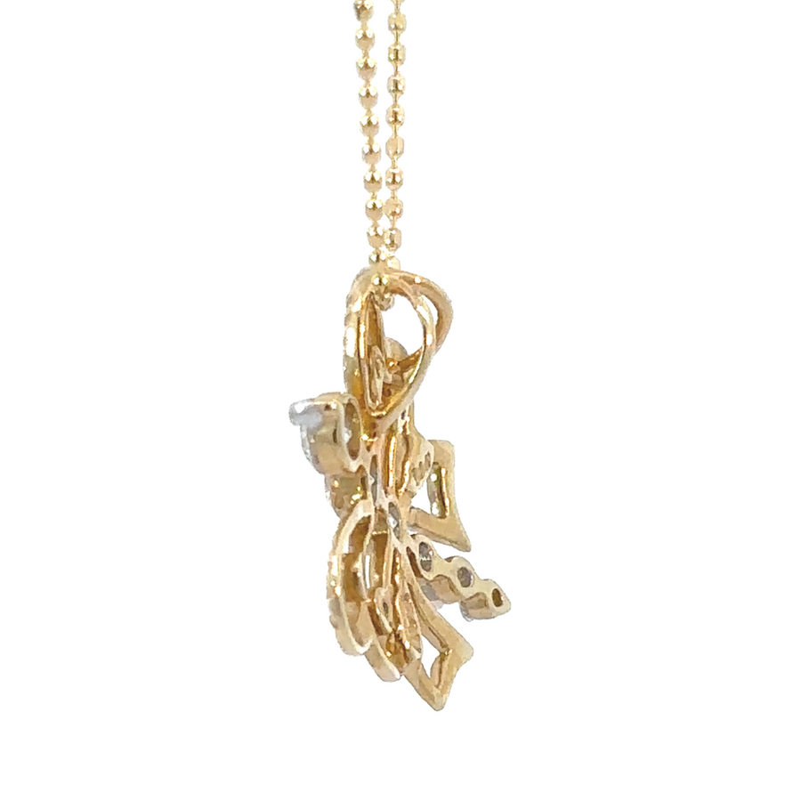 Elegant 14k gold butterfly pendant featuring sparkling diamonds