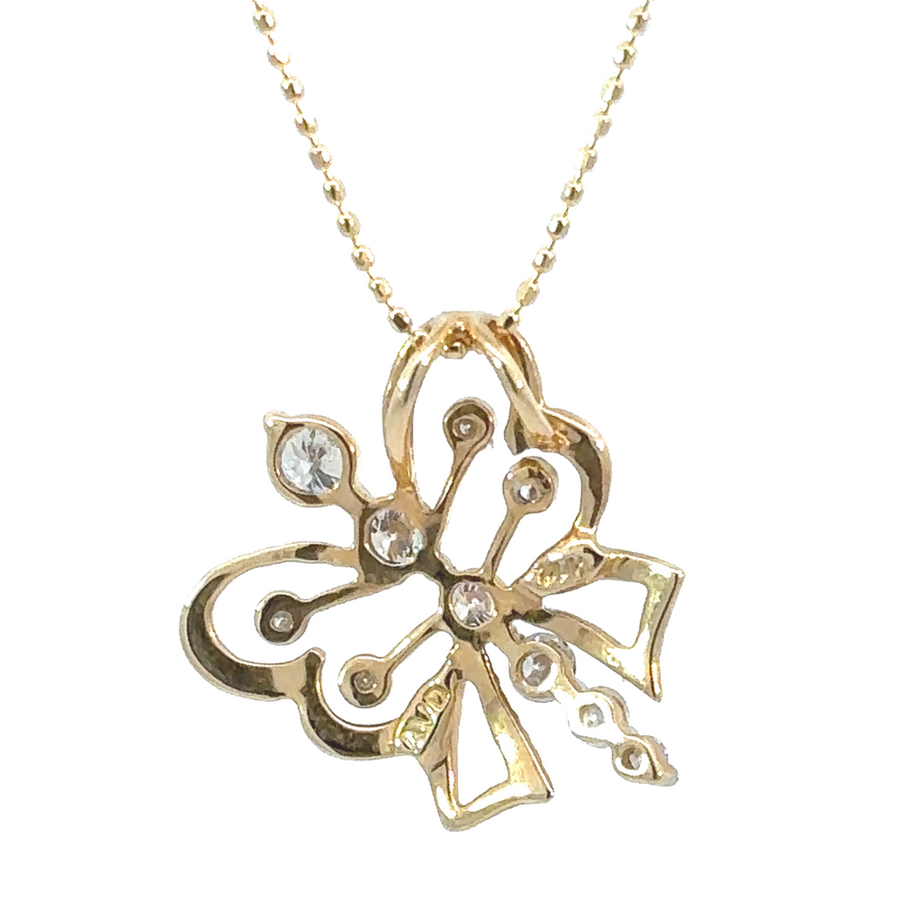 Women’s 14k gold pendant with butterfly design and diamonds