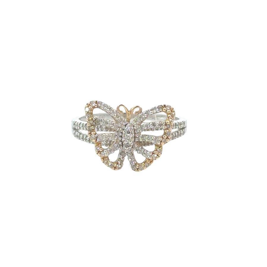 Woman’s hand wearing the butterfly ring to highlight its delicate elegance.