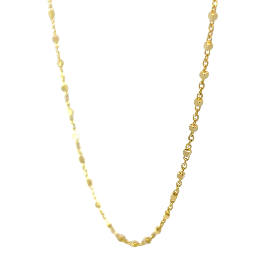 Close-up of 14k gold chain links highlighting craftsmanship and shine