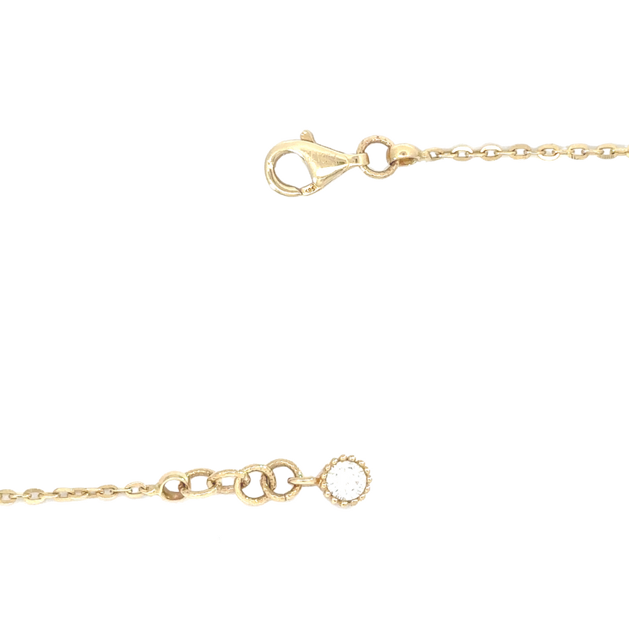14k gold chain laid flat, demonstrating its adjustable length
