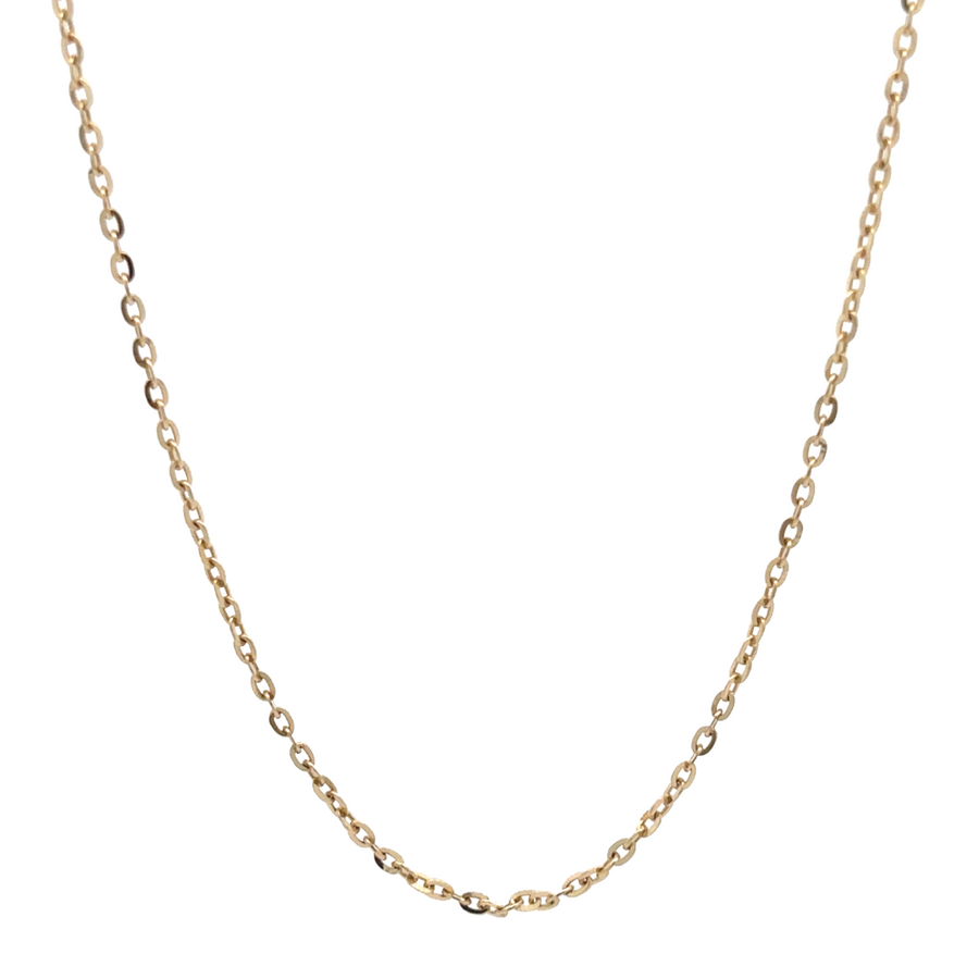 Model wearing 14k gold chain, showcasing its minimalist design