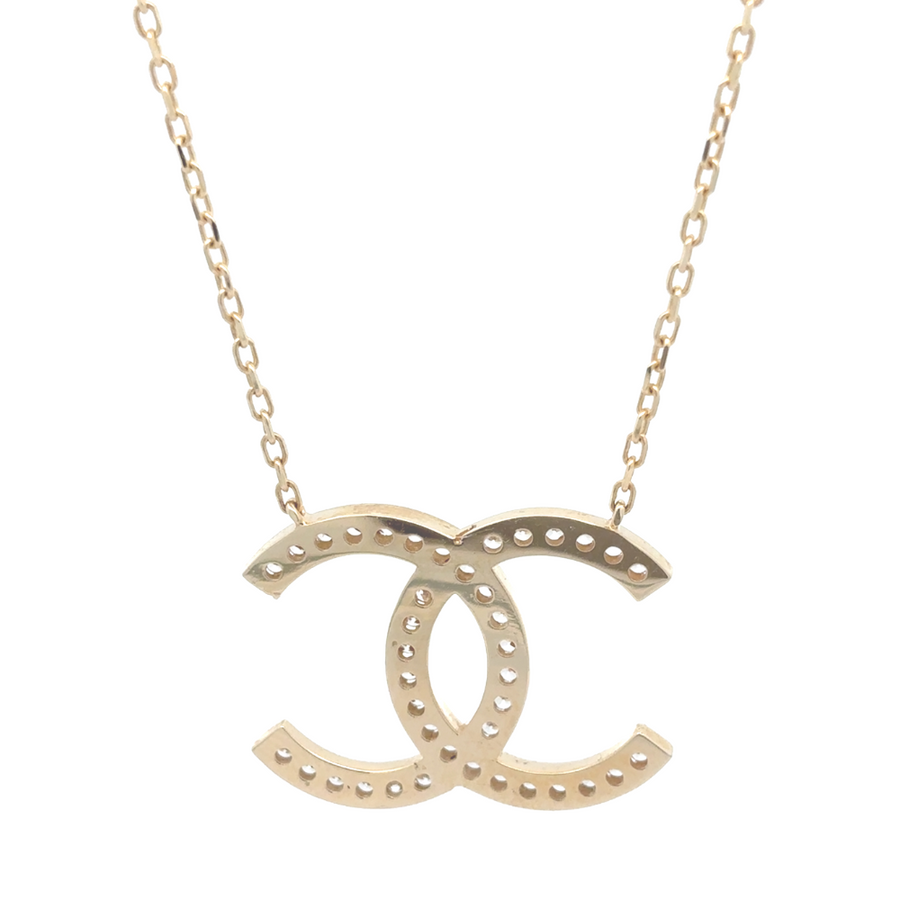 Elegant women's CZ gold necklace styled with a formal outfit